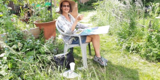 Carrollynne enjoying drawing in the FG Community Garden June 2021