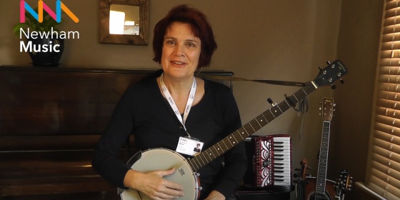 Music teacher smiling at camera