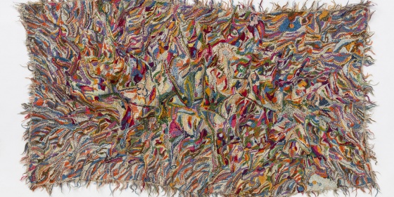 Multi coloured tapestry with frayed edges