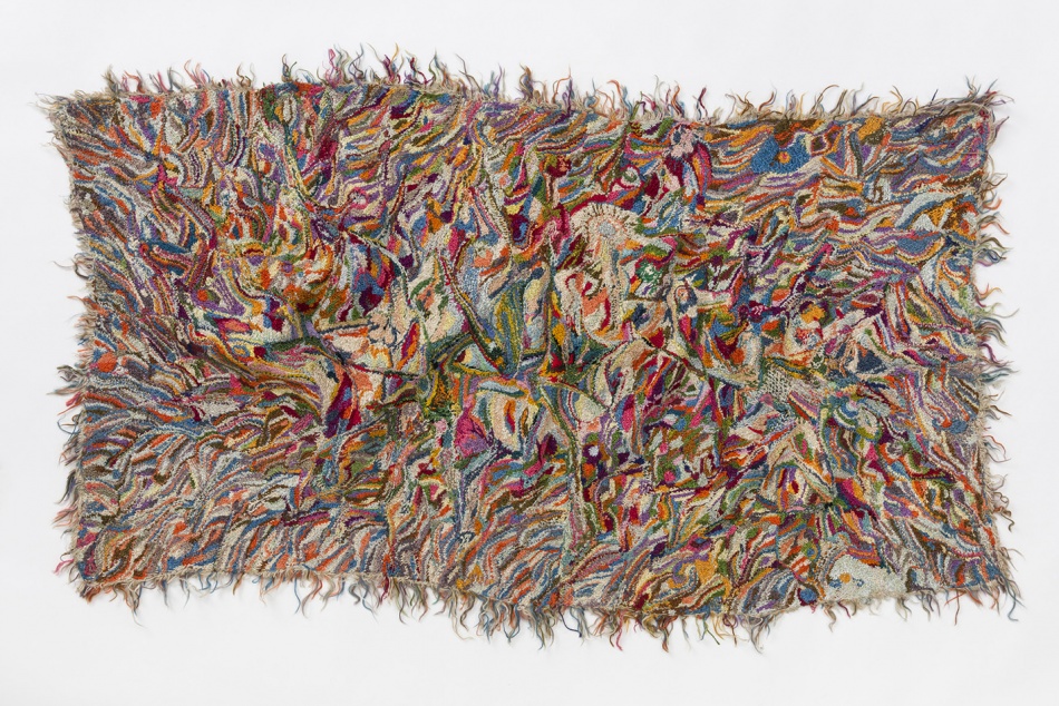 Multi coloured tapestry with frayed edges