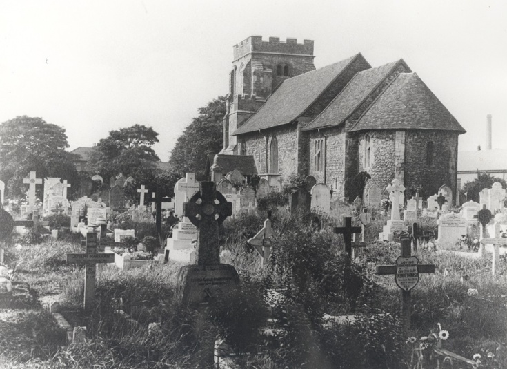 Black and white photo of exterior church and graveyard St Mary Magdalene East Ham Mary