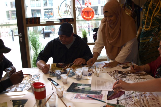 Textile designer Hafza Yusuf teaching a textile workshop