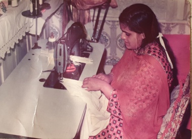 Naseem Begum at work on the sewing machine 