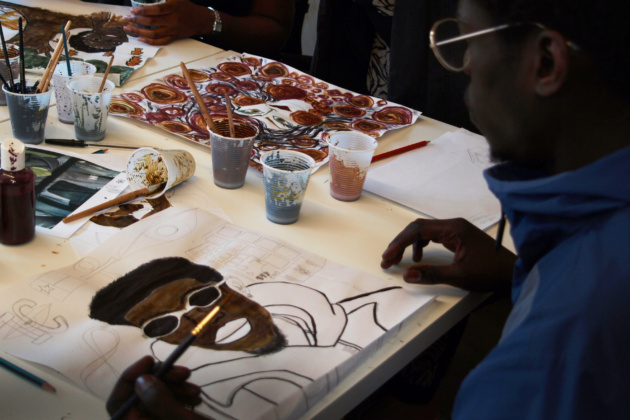 Textile designer Hafza Yusuf teaching a textile workshop